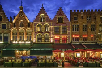 Bruges, Belgium, May 29, 2018: Bruges Grote markt square famous tourist place with many cafe and