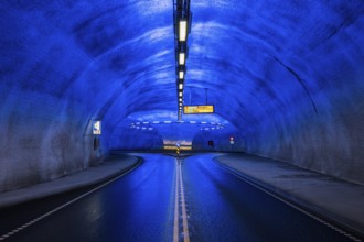 Blue illuminated roundabout in tunnel, Eidfjord, Hardangerfjord, Norway, Europe