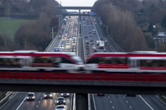 A3 motorway between Düsseldorf and Leverkusen, near Erkrath, railway bridge, Regio train
