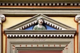A so-called gaff head on the façade of the Haus zum Roten Ochsen, Renaissance, Erfurt, Thuringia,