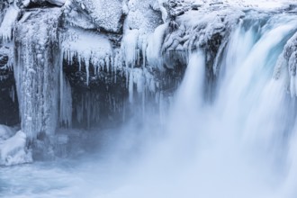 Godafoss waterfall, icy and snowy rock face, Northern Iceland Eyestra, Iceland, Europe