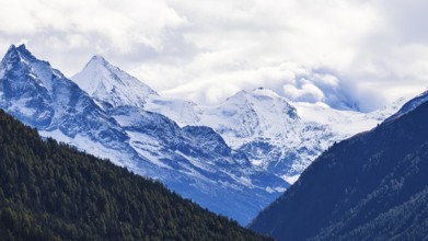 Snow-covered peaks of the mountains Le Besso, and Obergabelhorn, Val d'Anniviers, Valais Alps,