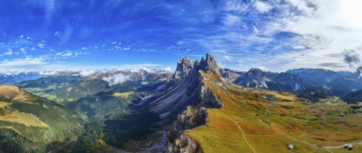 The peaks Sas Rigais and Furchetta of the Geisler group, wide-angle panoramic photo, drone photo,