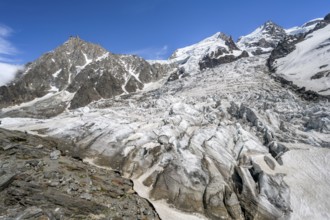 High alpine glaciated mountain landscape, La Jonction, Glacier des Bossons meets Glacier de