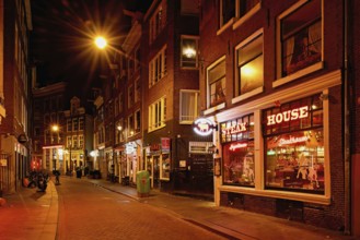 Zeedijk popular street with many restaurants, historic city centre, near red light district,