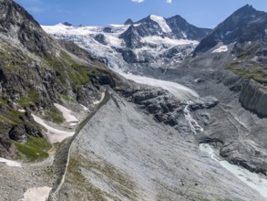 View to mountain hut Cabane de Moiry, located close to the retreating Moiry glacier, hiking trail
