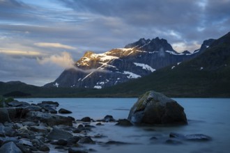 Landscape with sea and mountains on the Lofoten Islands, view over the fjord Flakstadpollen to