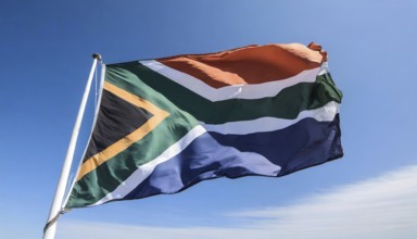 Flags, the national flag of South Africa flutters in the wind