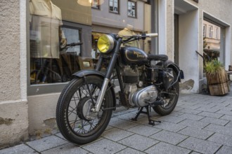 Vintage motorbike from the Indian motorbike manufacturer Royal Enfield in the old town of Ulm,