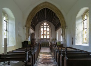 Interior view to altar and east window church of All Saints, Rede, Suffolk, England, UK