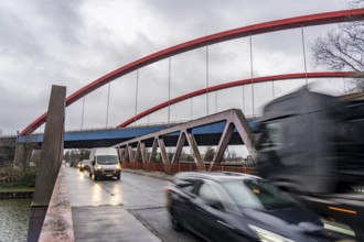 Dilapidated A42 motorway bridge (red arches) over the Rhine-Herne Canal, with massive structural
