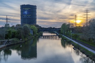 Neue Mitte Oberhausen, Gasometer exhibition hall, after renovation, Rhine-Herne Canal, evening