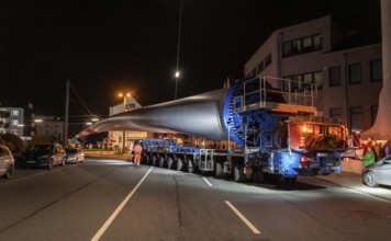 Transport of a 68 metre long, 22 tonne blade of a wind turbine, here in Schwelm, with a