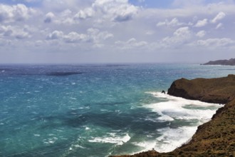 Mirador de La Amatista with views of the rocky coast and turquoise sea, coastline at La Isleta,