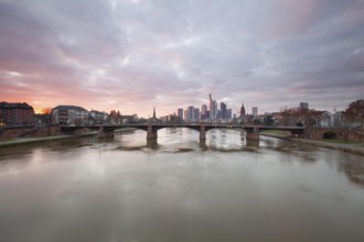 Frankfurt am Main. Beautiful sunset on the bridge over the Main with a view of the Frankfurt