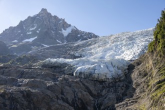 Impressive mountain landscape with glacier, glacier tongue of the Glacier des Bossons and summit of