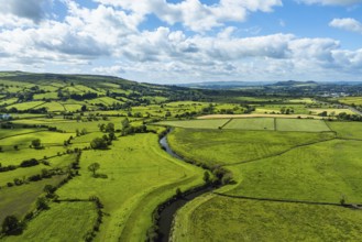 Farms and Fields over Cononley and River Aire from a drone, Keighley, North Yorkshire, England,