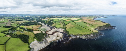 Panorama of Cliffs over Mothecombe Beach and Red Cove from a drone, River Emme, Mothecombe,