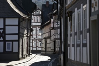 Narrow alley with half-timbered houses and cobblestones in the old town, UNESCO World Heritage