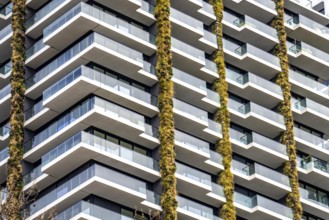 Facade of the Eden Tower on Europa-Allee in Frankfurt am Main, green facade, residential building,