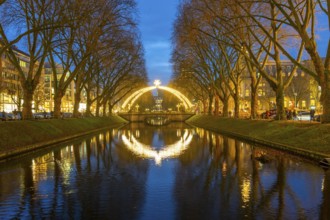 Christmas market, on Königsallee, Kö, Stadtgraben pond, Christmas lights, in the city centre of