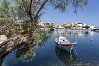 The village of Agios Nikolaos, in the eastern part of Crete, view over Lake Voulismeni, connected