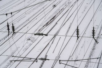 Onset of winter with lots of fresh snow and temperatures below -5 degrees during the day, railway