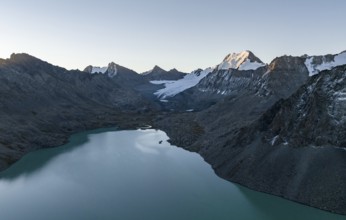 Mountain panorama, aerial view, 4000 metre peak with glacier, mountain pass and mountain lake