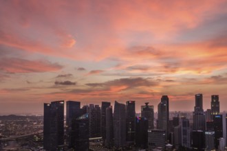 Dramatic sunset and purple clouds over Singapore city centre