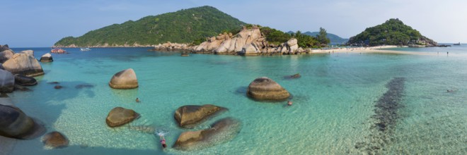 Bathing bay with turquoise water and granite rocks on the holiday island Nang Yuan Island, island,
