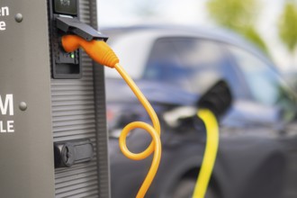 Electric cars at charging stations, Dresden, Saxony, Germany, Europe