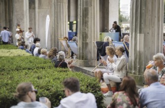 Reading by Ulrike C. Tscharre and live music at the Kolonnaden Bar on Museum Island in Berlin,