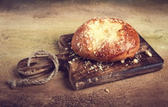 Bun with cottage cheese, pastries, cheesecake, no people