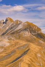 Mountain ridge with paths in warm autumn tones, Planplatten, Switzerland, Europe