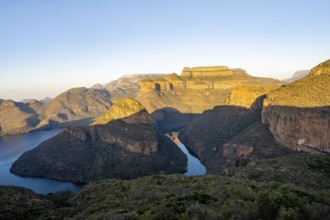 Sunset at Blyde River Canyon with GIpfel Three Rondawels, view of canyon with Blyde River and Mesa