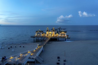 The pier of Sellin, evening mood, sunset, 394 metres long, with restaurant, jetty, island of Rügen,