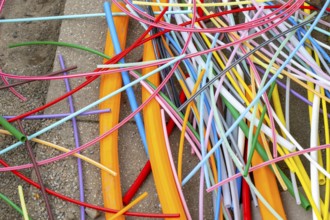 Cable remnants from empty conduits for fibre optic cables that have been laid, in which the actual