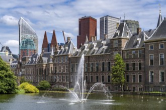 The historic Binnenhof, seat of the Dutch government, Hofvijver pond, skyline of the city centre at