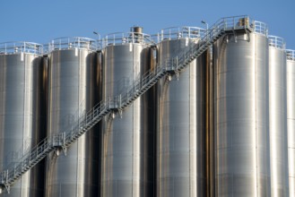 Stainless steel tanks of a large silo facility in Duisburg inland harbour, Duisburg-Neuenkamp, for