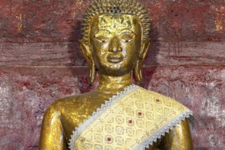Golden Buddha statue, Bhumispara-mudra, Buddha Gautama at the moment of enlightenment, Wat Long
