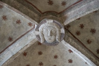 Head of Christ, in the cross-ribbed vault, chancel of the Romanesque St Michael's Church,