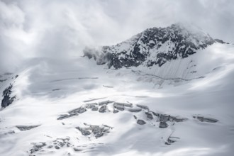 Snow and glacier ice with crevasses on the Waxeggkees glacier, Berliner Höhenweg, Zillertal Alps,