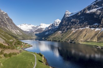 Panorama aerial view of fjord Hjørundfjord towards village Øye at end of fjord, Norway, Europe