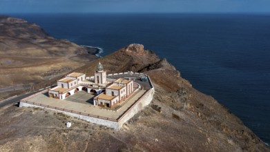 Bird's eye view of aerial view of building complex of lighthouse Faro de la Entallada from 50s year