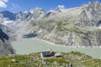 Capanna da l'Albigna, Albinga hut, above dam of reservoir Lake Albigna near village Vicosoprano,
