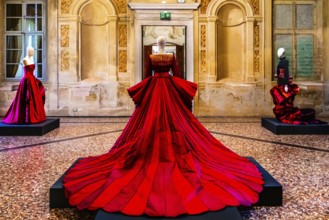 Red silk Mikado wedding dress in various shades of red with embroidered bodice, 2009, exhibition of