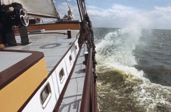 Clipper sailing on the Wadden Sea, the Netherlands