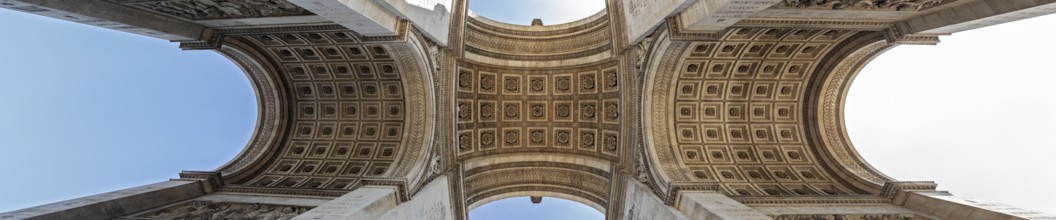 Panoramic view of the interior of the Arc de Triomphe with impressive symmetry, Paris