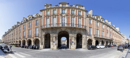 Impressive building with arcades at a crossroads, Paris