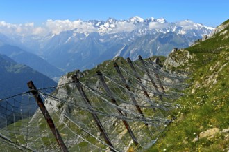 Snow nets as avalanche protection at the summit of Pierre Avoi, behind the summit chain of the